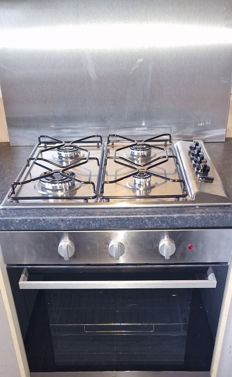 Gas hob and oven fitted in kitchen